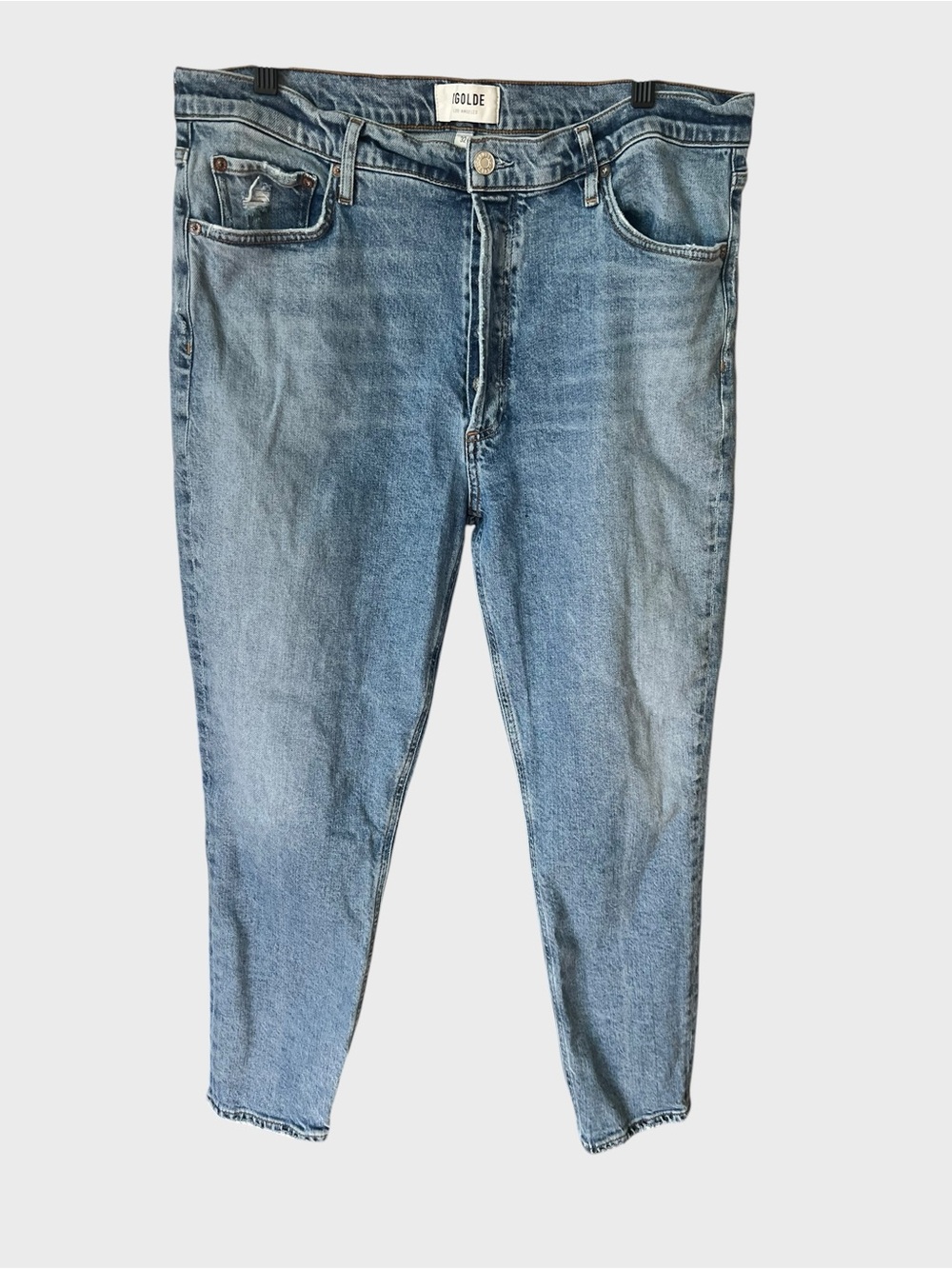 Agolde Women’s light wash jeans.